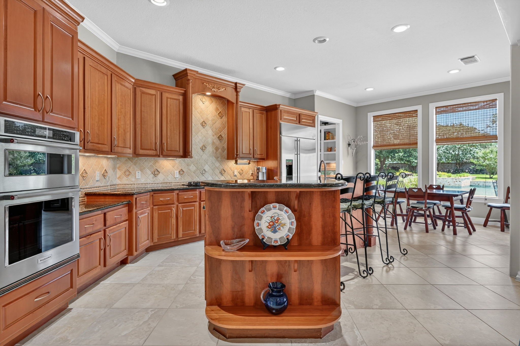 15 White Meadow Court Spring, TX 77379 - Photo 13 of 48 Newer KitchenAid appliances with microwave. Built in stainless refrigerator