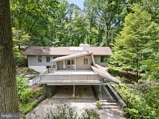 a aerial view of a house with a balcony