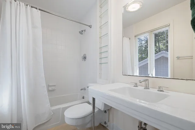 a view of a chairs and table in the patio
