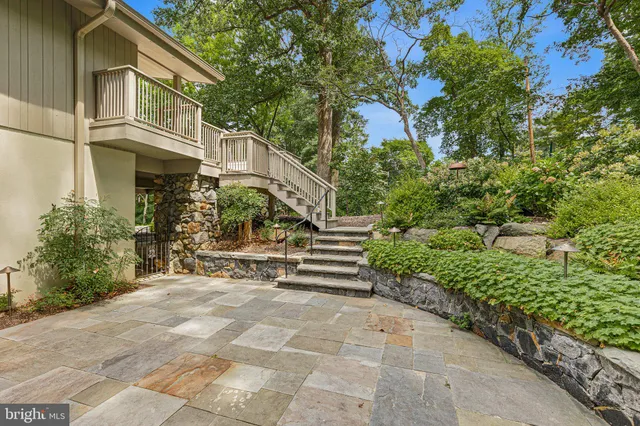a view of a house with a street