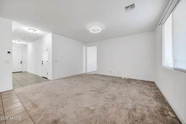 an empty room with a natural light