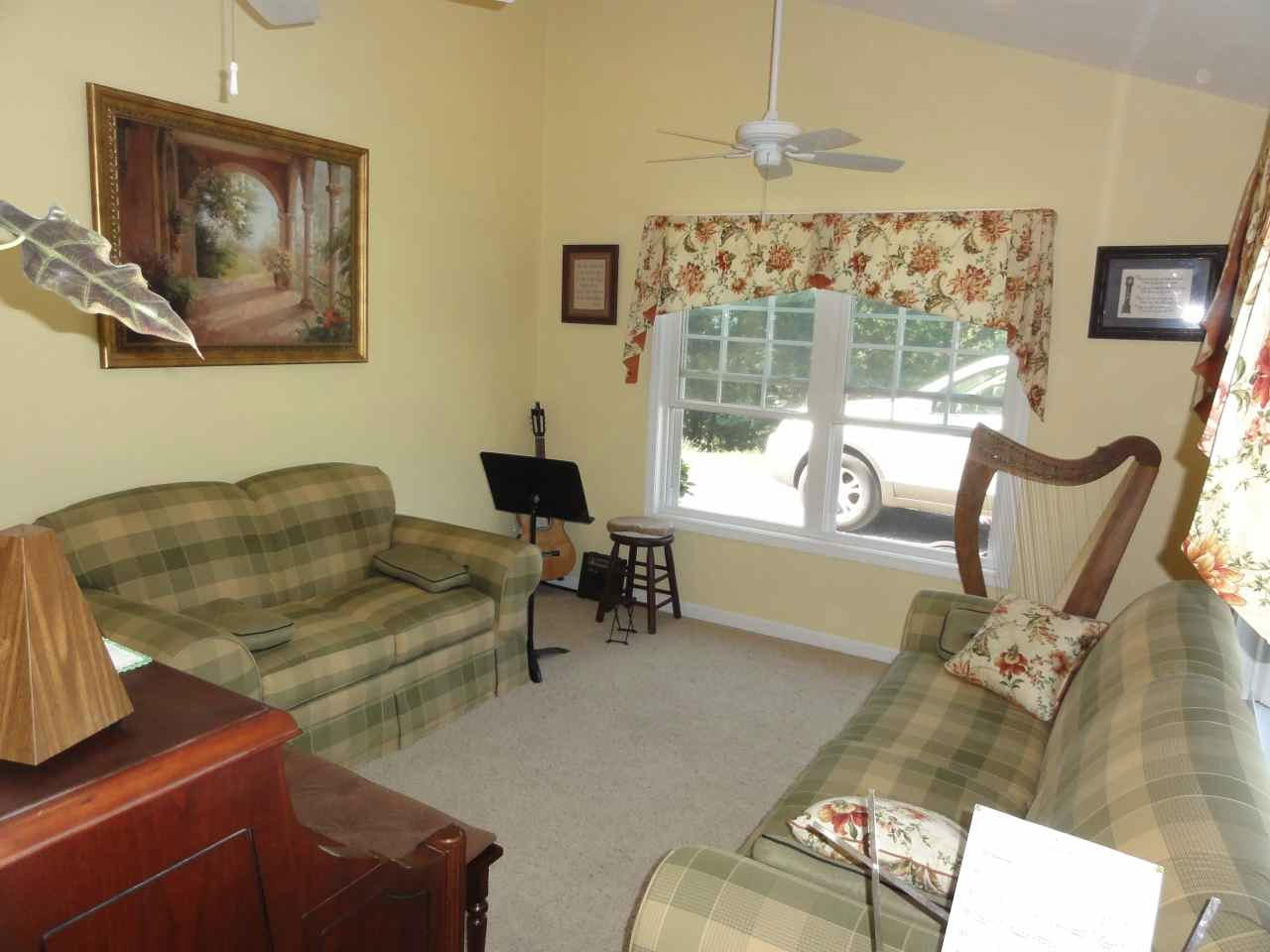 584 Zimmerman Road Blue Ridge, VA 24064 - Photo 5 of 33 a living room with furniture and a large window
