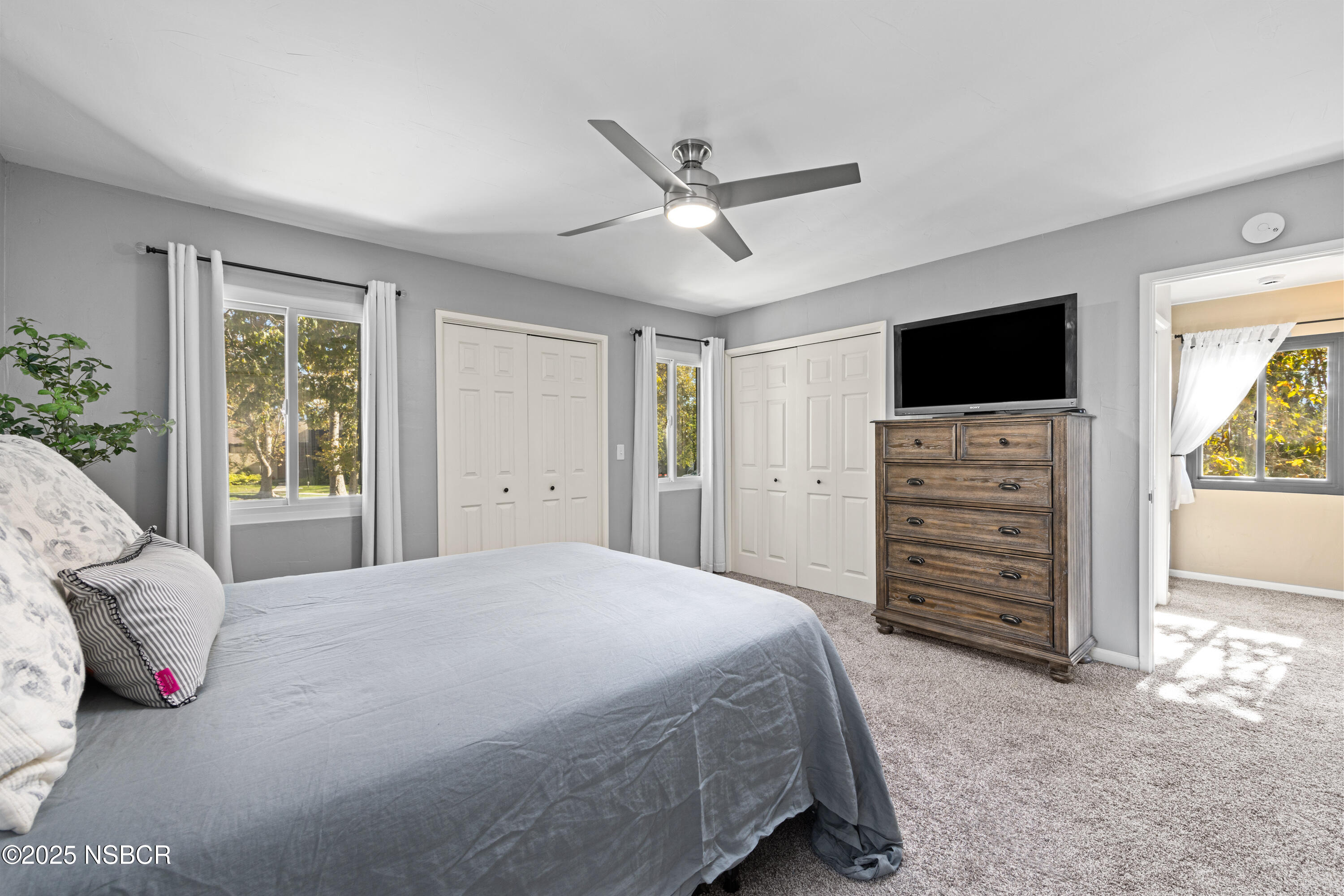 639 Roskilde Road Solvang, CA 93463 - Photo 15 of 27 a bedroom with a bed and a television