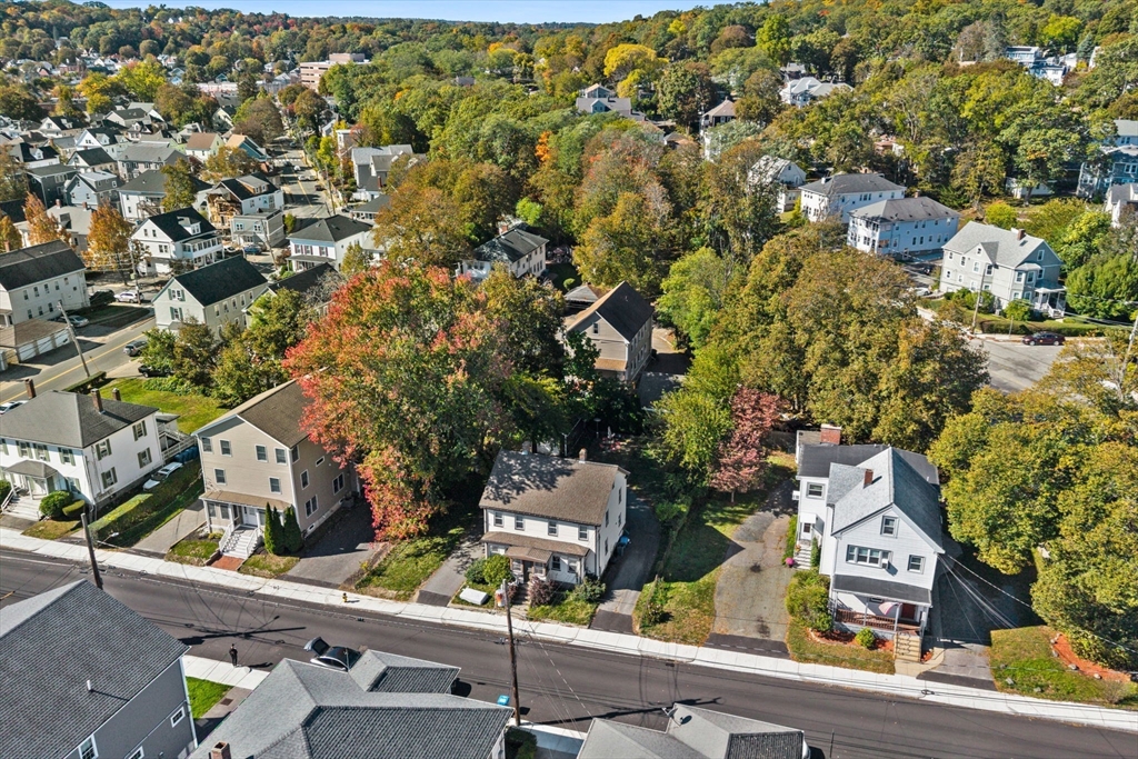 88 Hammond Street Waltham, MA 02451 - Photo 3 of 4 an aerial view of residential houses with outdoor space