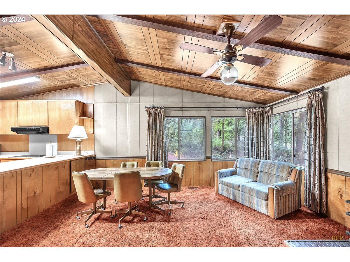 56925 Walker Road Scappoose, OR 97056 - Photo 13 of 40 a living room with furniture and a large window