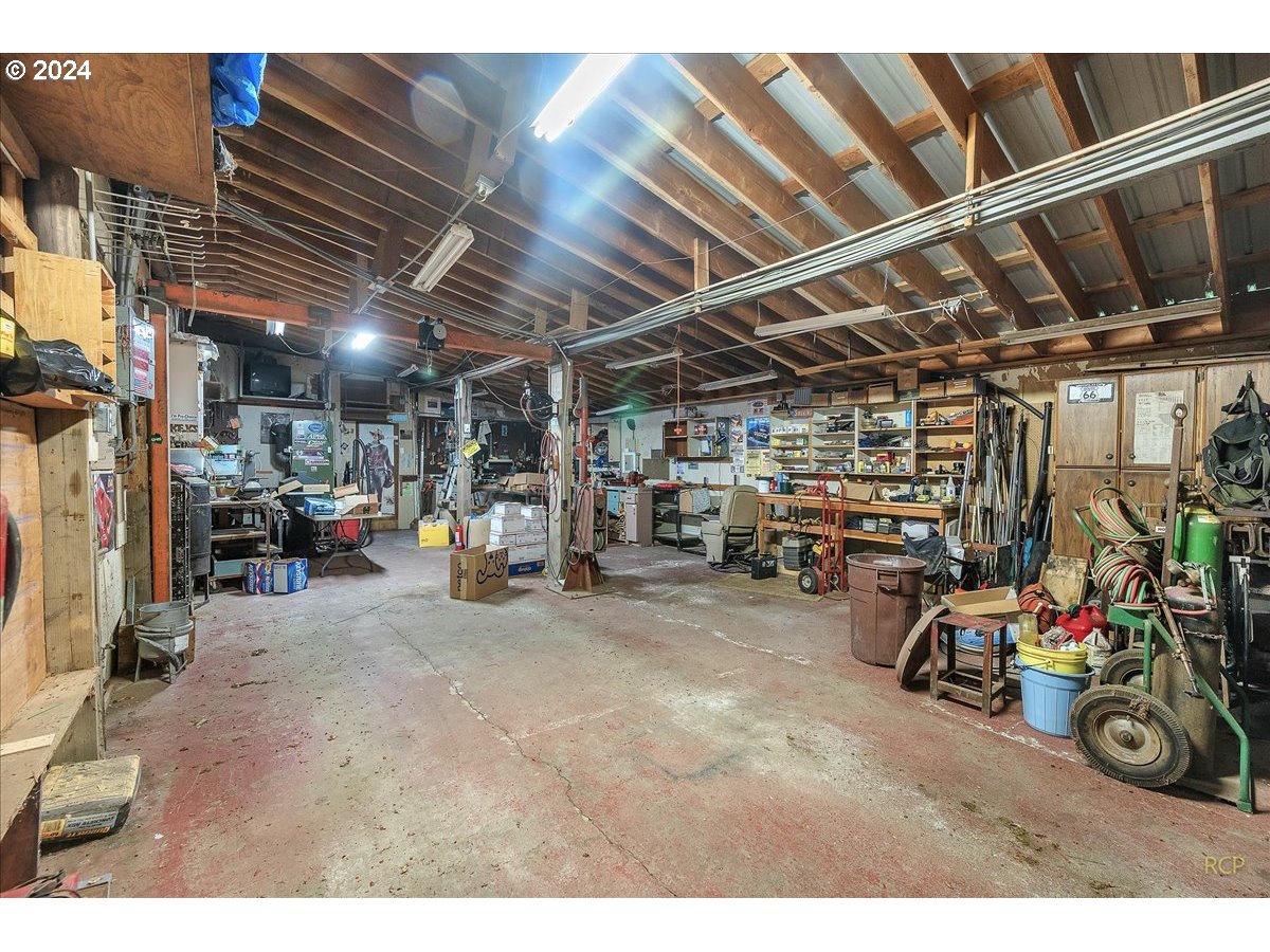 56925 Walker Road Scappoose, OR 97056 - Photo 29 of 40 a view of parking garage with cars