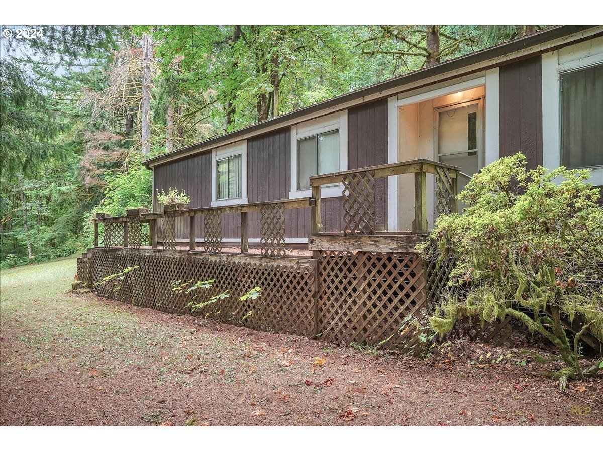 56925 Walker Road Scappoose, OR 97056 - Photo 3 of 40 a view of a house with a yard