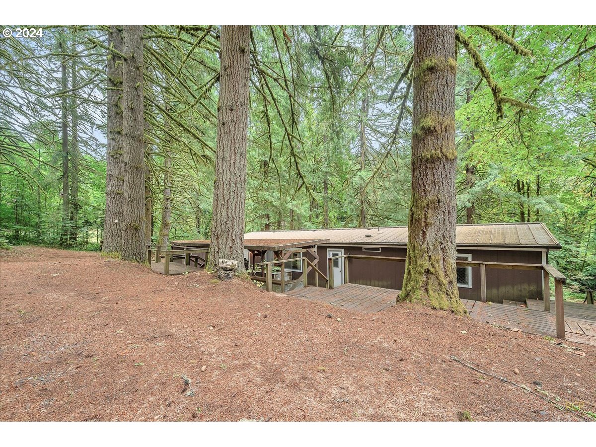 56925 Walker Road Scappoose, OR 97056 - Photo 5 of 40 a view of a patio with furniture and a yard