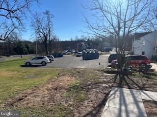 347 East Butler Avenue, Unit I Doylestown, PA 18901 - Photo 5 of 5 a view of a yard with large trees