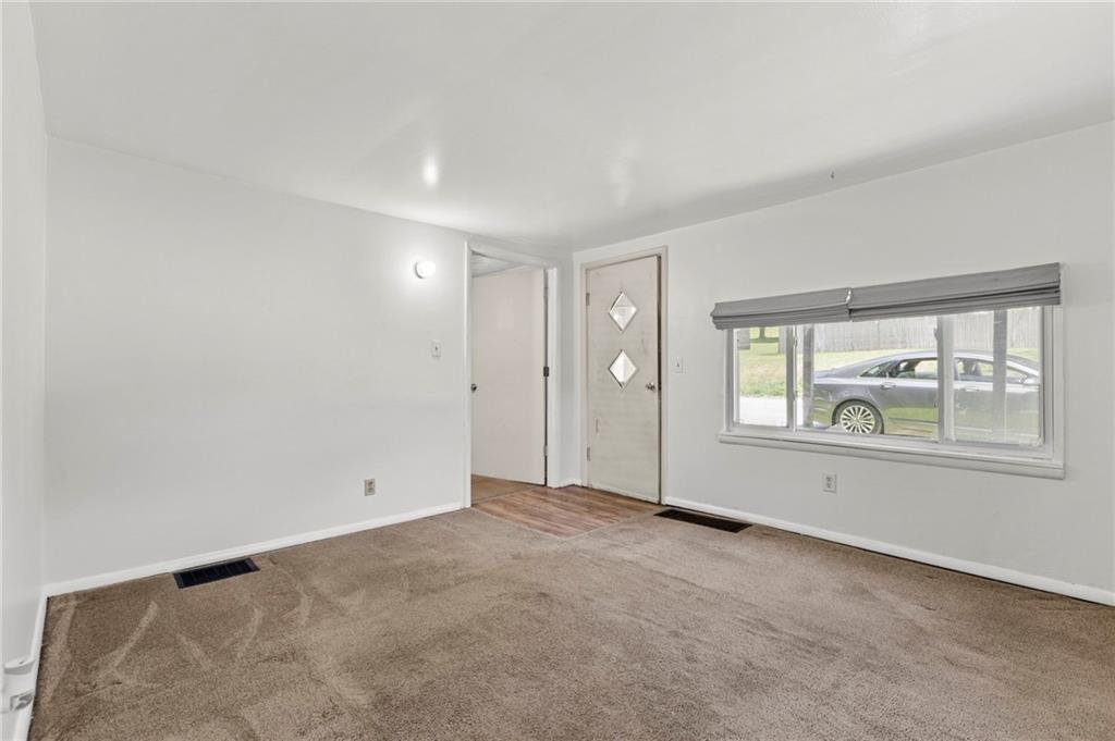 563 Oneida Valley Road Butler, PA 16001 - Photo 8 of 23 an empty room with windows