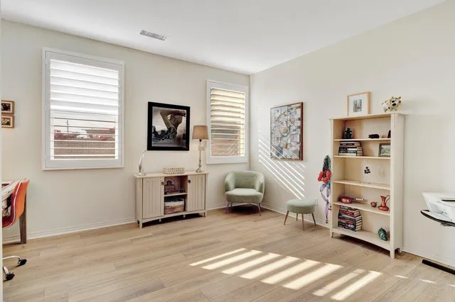 a view of a livingroom with shelves