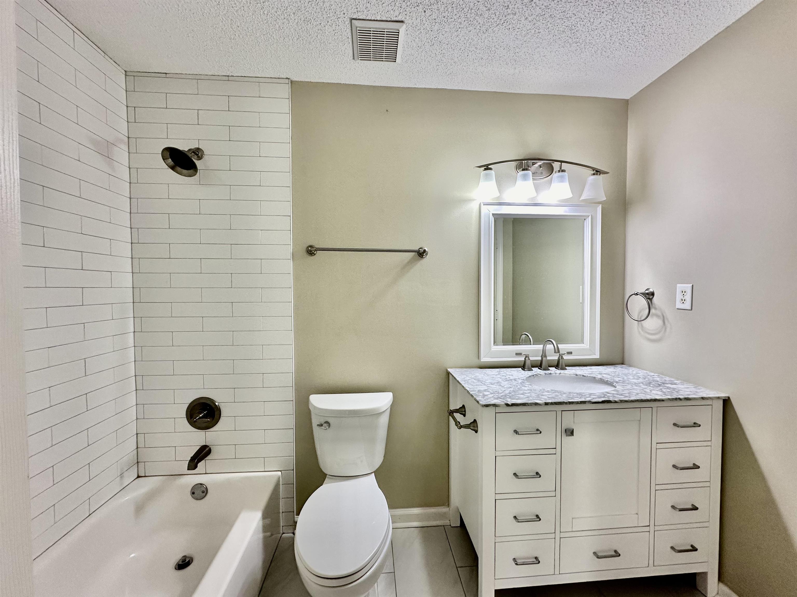 3536 Ray Bluff Road Millington, TN 38053 - Photo 11 of 17 a bathroom with a sink a toilet and shower