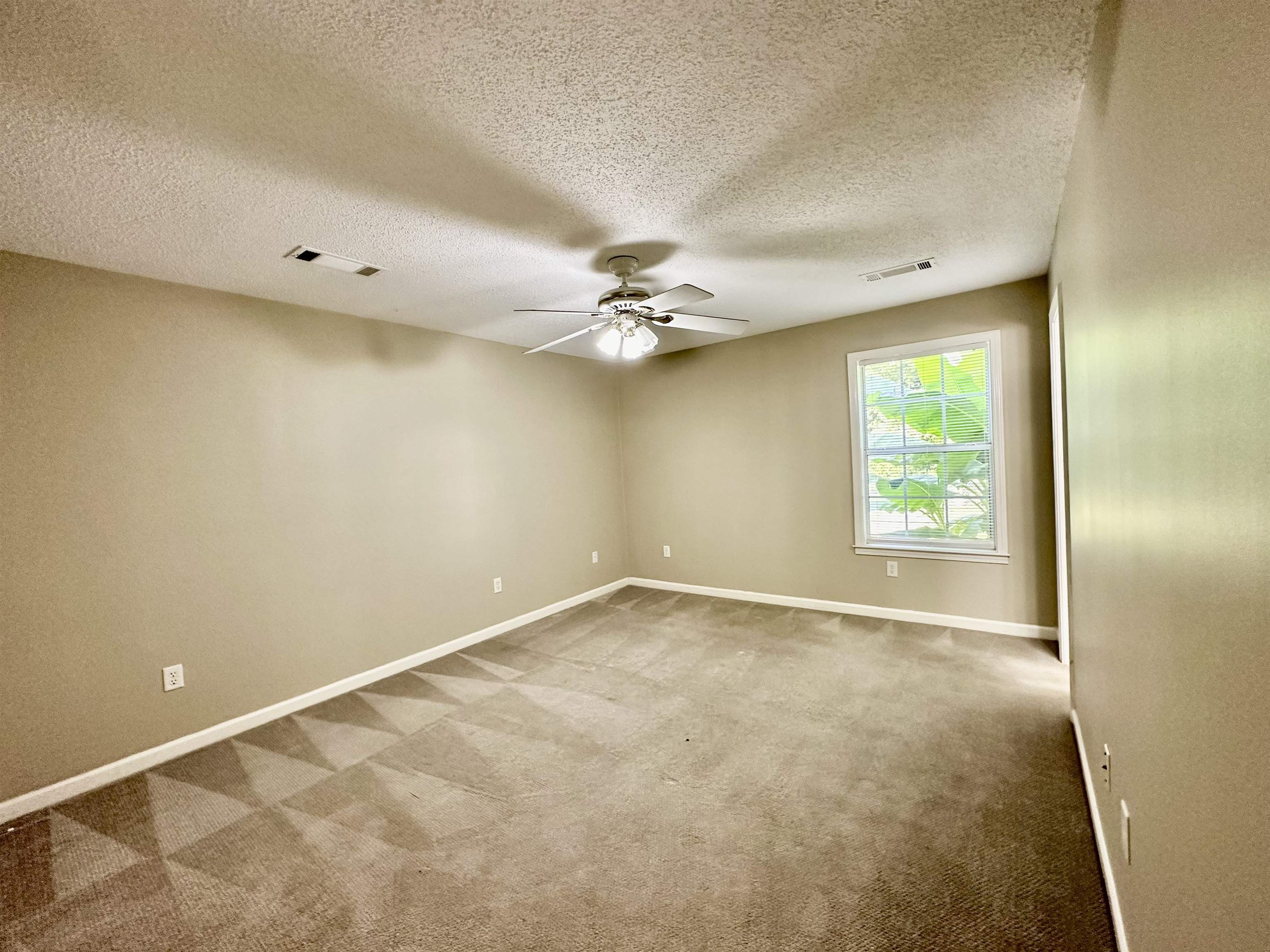 3536 Ray Bluff Road Millington, TN 38053 - Photo 13 of 17 an empty room with a window