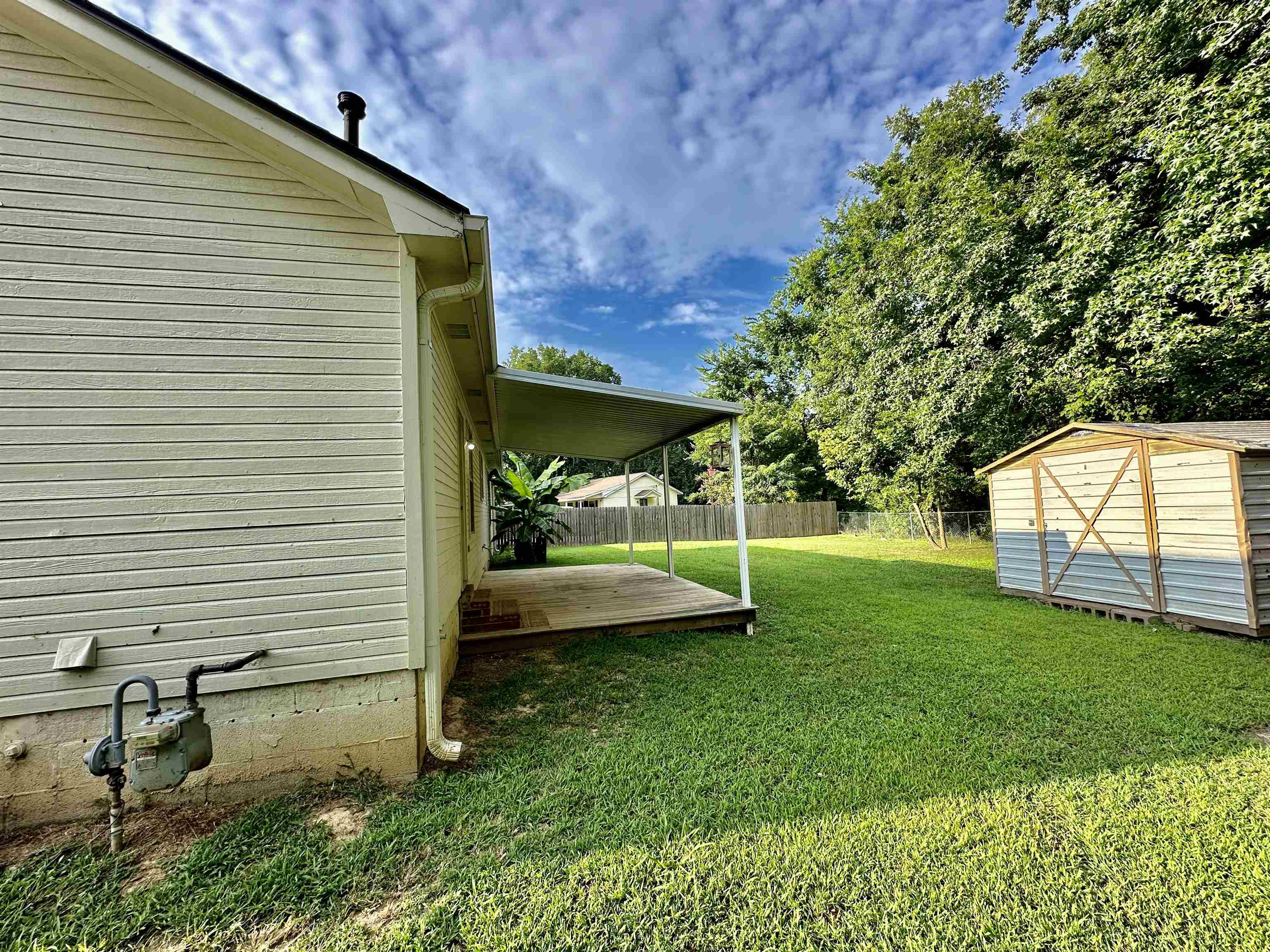 3536 Ray Bluff Road Millington, TN 38053 - Photo 14 of 17 a view of a backyard with a garden
