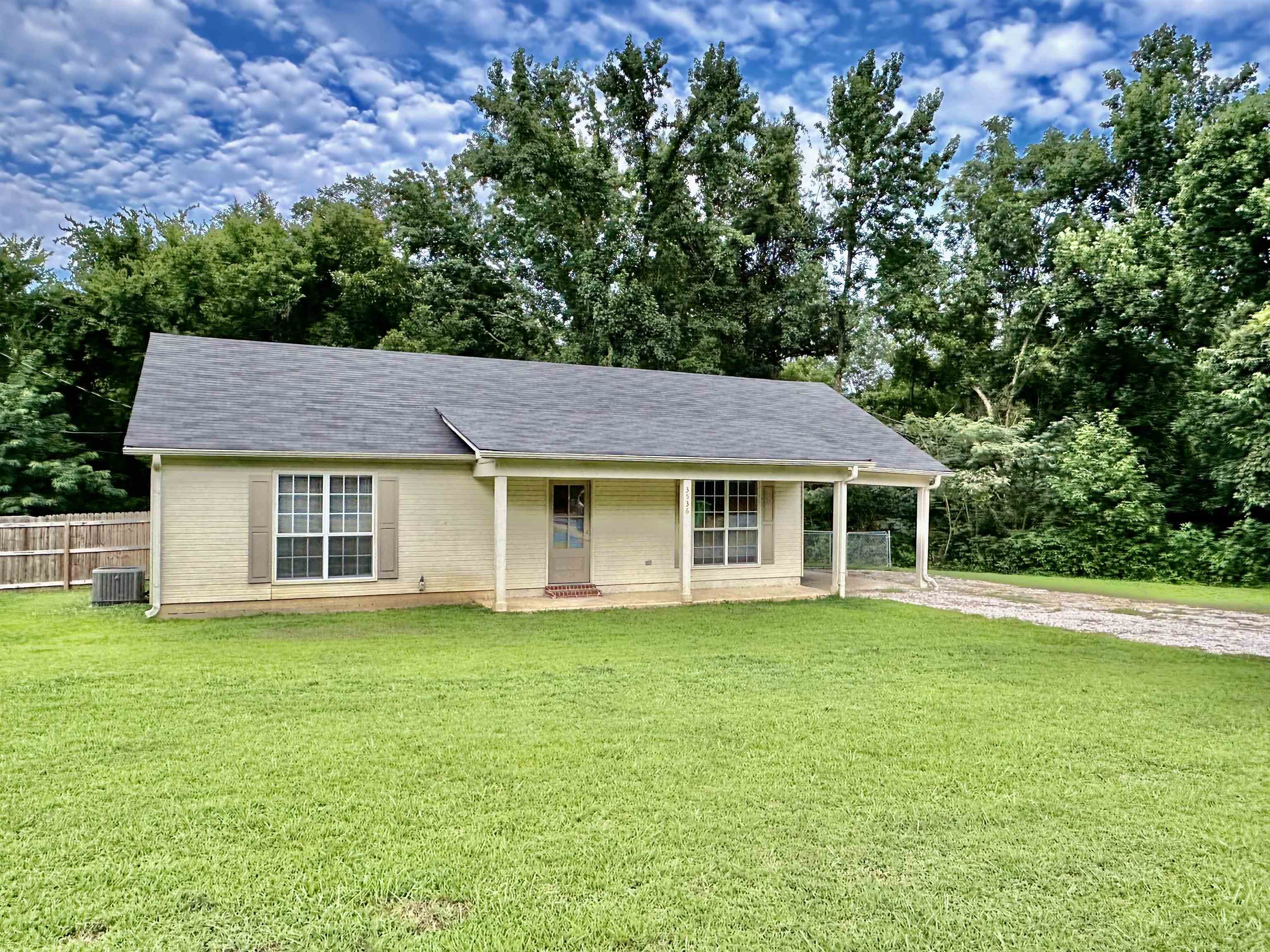3536 Ray Bluff Road Millington, TN 38053 - Photo 16 of 17 front view of a house with a garden