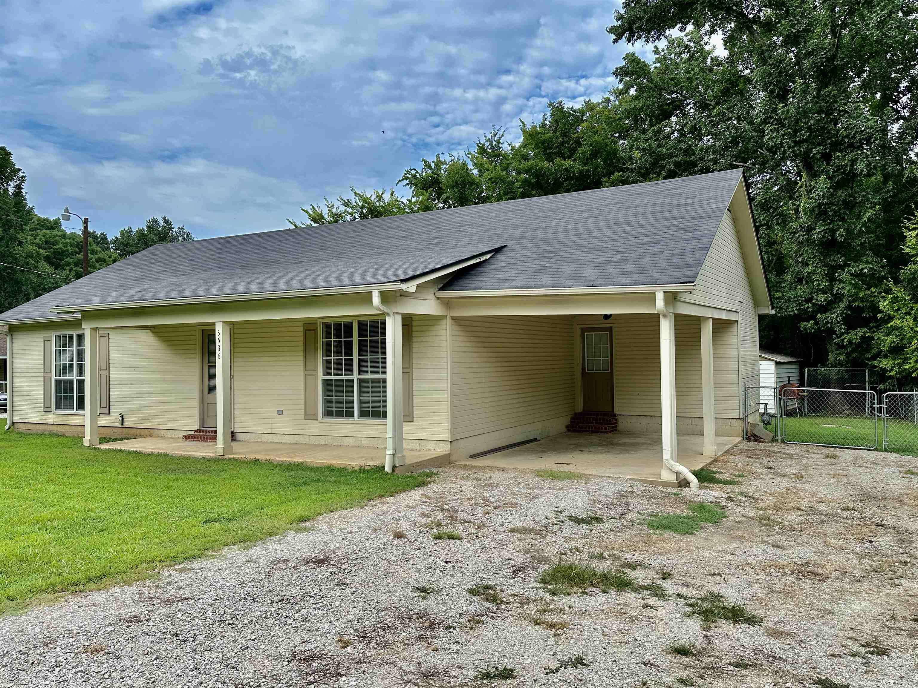 3536 Ray Bluff Road Millington, TN 38053 - Photo 17 of 17 a front view of a house with garden