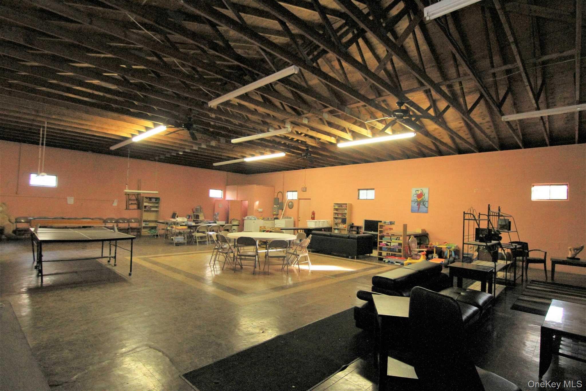 50 Glanhope Road, Unit 23 Hopewell Junction, NY 12533 - Photo 25 of 33 a view of a gym with lots of tables and chairs