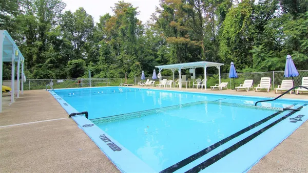 a view of an outdoor space and swimming pool