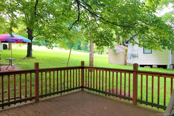a view of a street view from a balcony