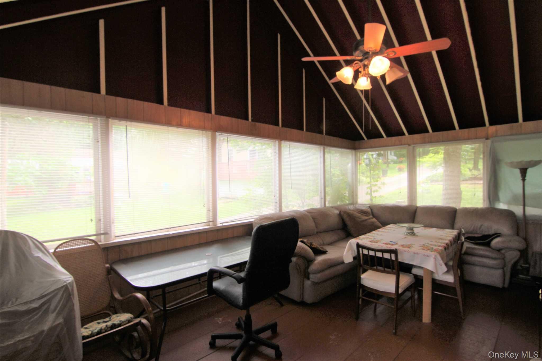 50 Glanhope Road, Unit 23 Hopewell Junction, NY 12533 - Photo 7 of 33 a living room with furniture and a window