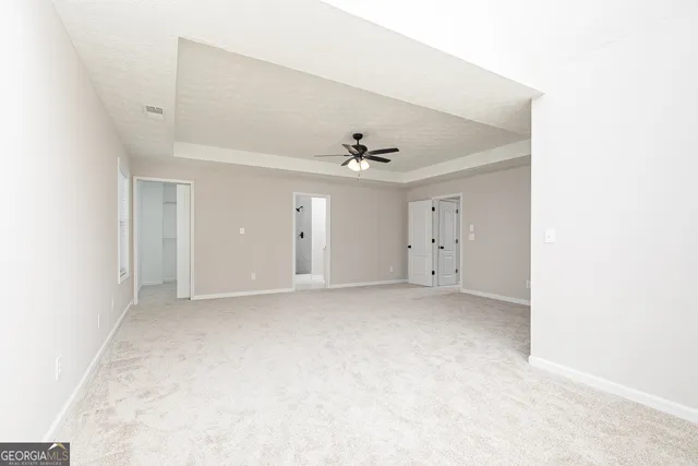 a bathroom with a sink a shower and a mirror