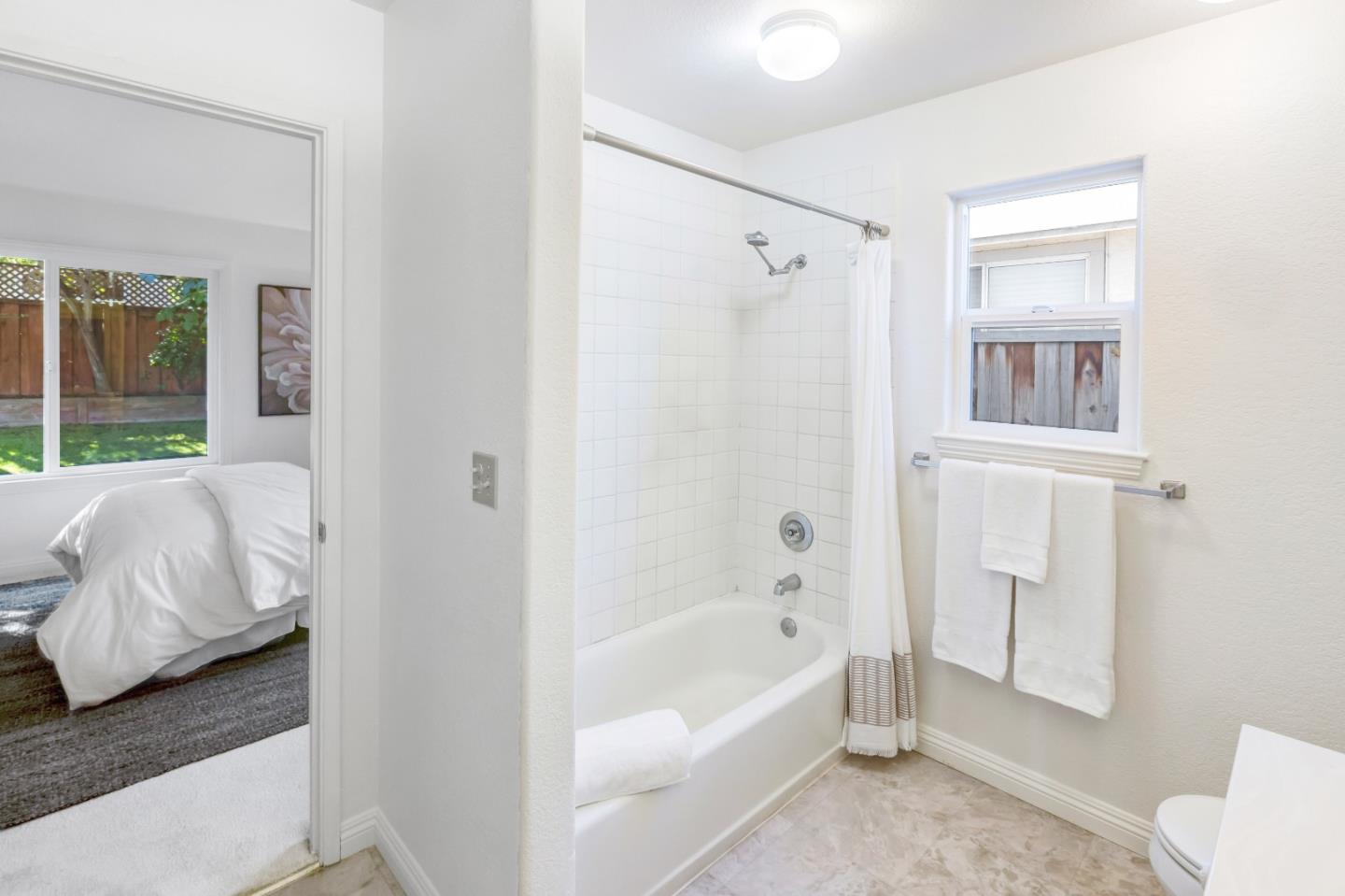 17602 Winding Creek Road Salinas, CA 93908 - Photo 10 of 15 a bathroom with a tub shower and sink