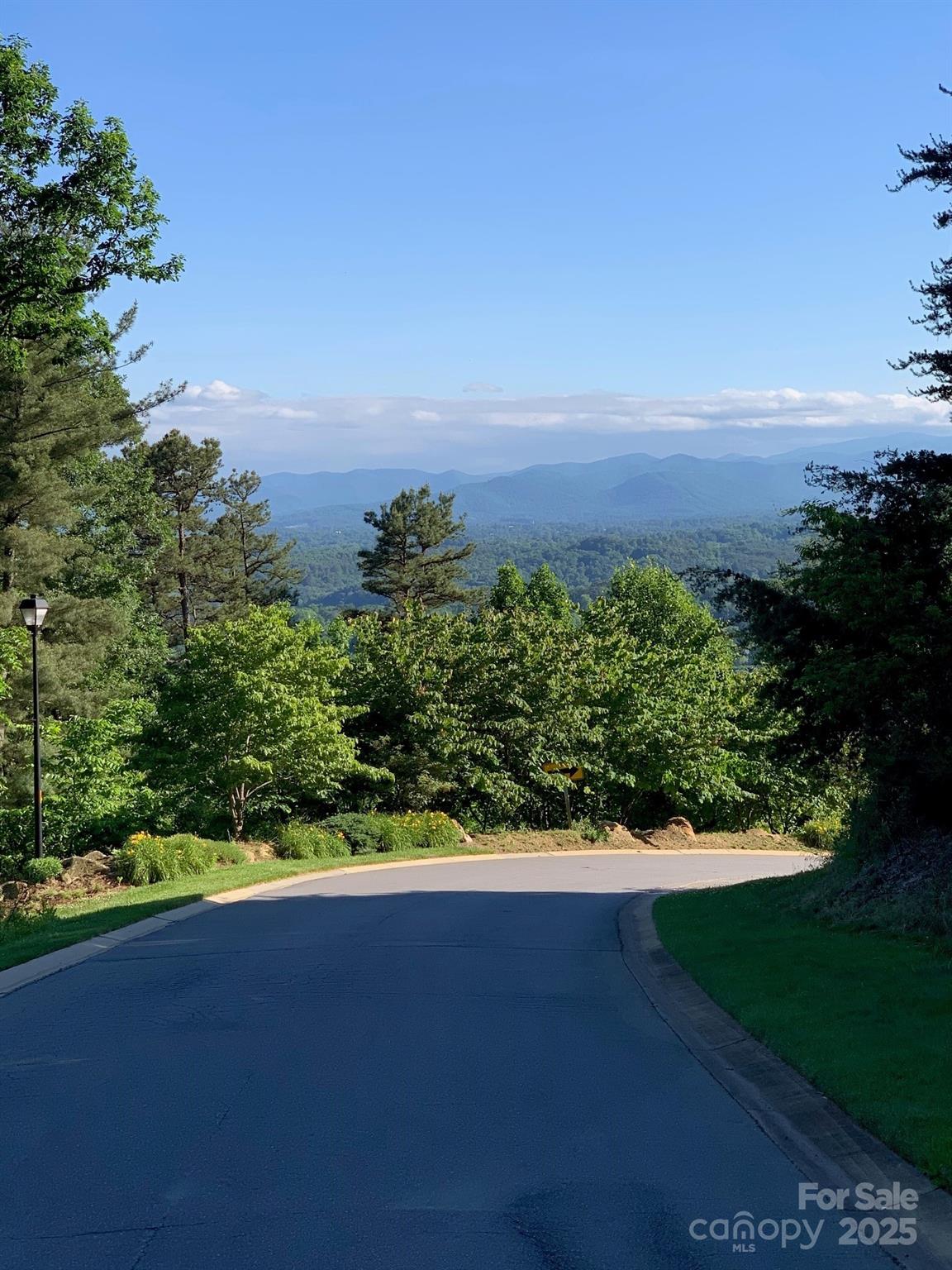 175 Senator Reynolds Road, Unit 23 Asheville, NC 28804 - Photo 2 of 5 an aerial view of a houses with a yard