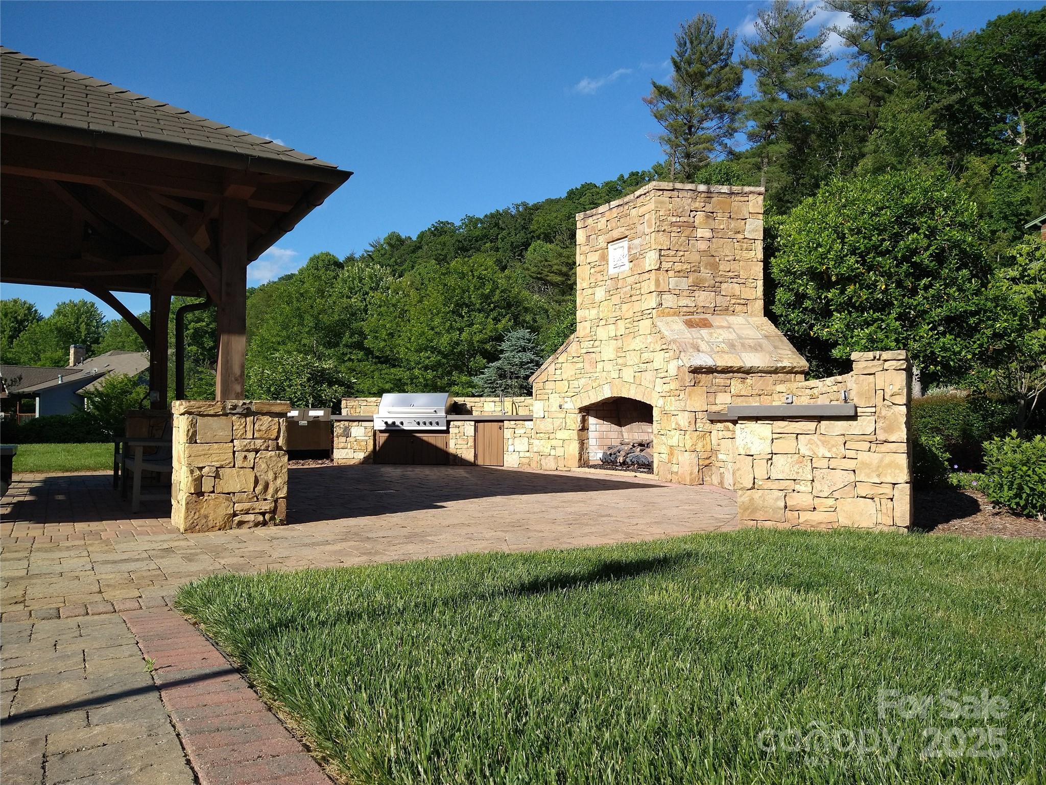175 Senator Reynolds Road, Unit 23 Asheville, NC 28804 - Photo 4 of 5 a view of a house with backyard and porch