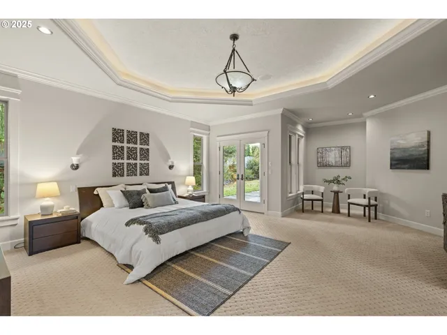 a bathroom with a granite countertop sink a large mirror and a bathtub