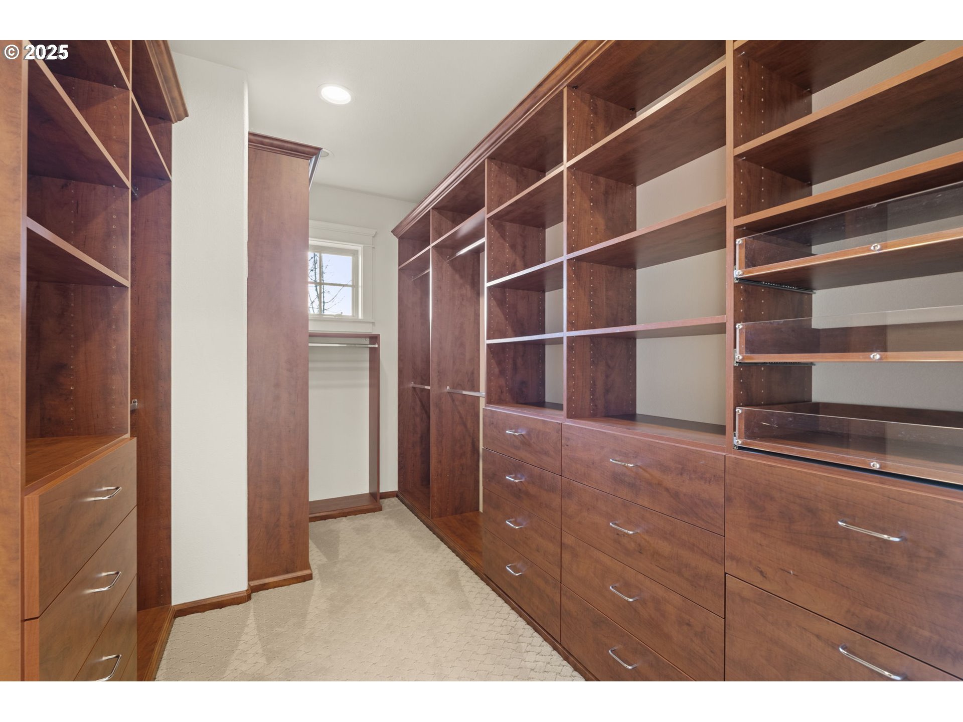 6035 Fernhill Loop Springfield, OR 97478 - Photo 34 of 48 a view of walk in closet with empty racks