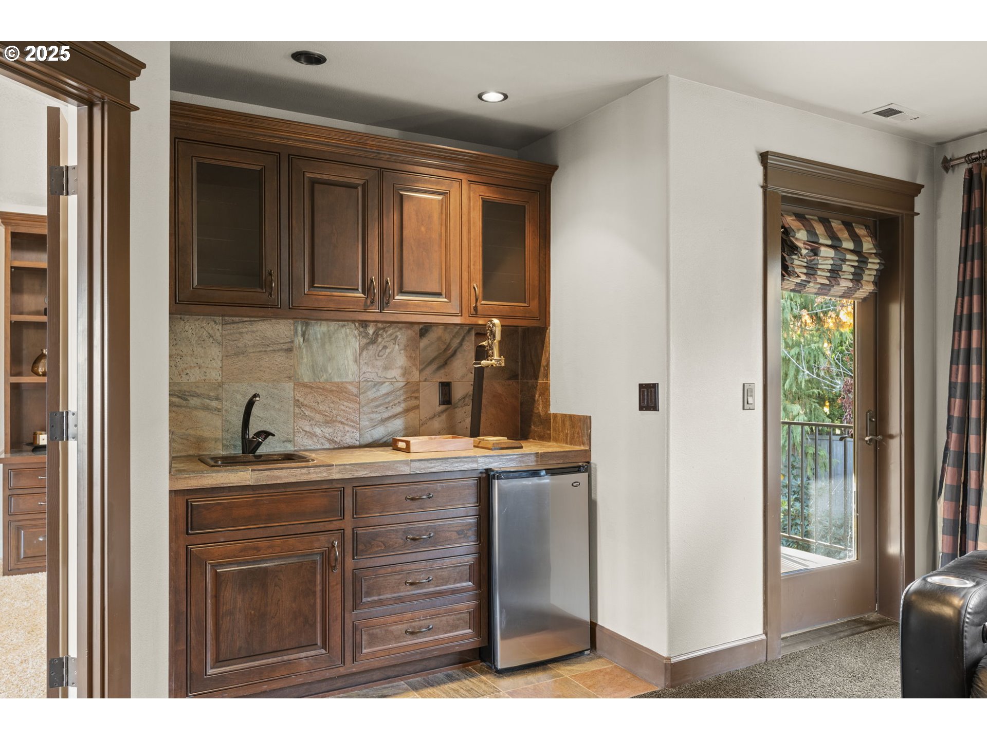 6035 Fernhill Loop Springfield, OR 97478 - Photo 37 of 48 a kitchen with a granite countertop sink and cabinets