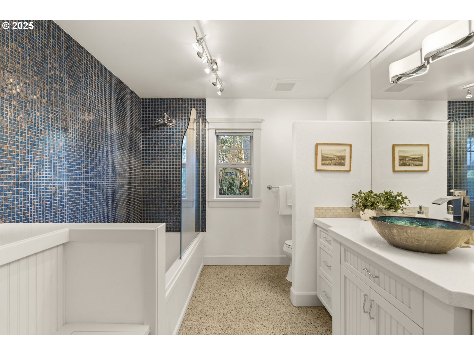 6035 Fernhill Loop Springfield, OR 97478 - Photo 42 of 48 a bathroom with a sink a mirror and a shower