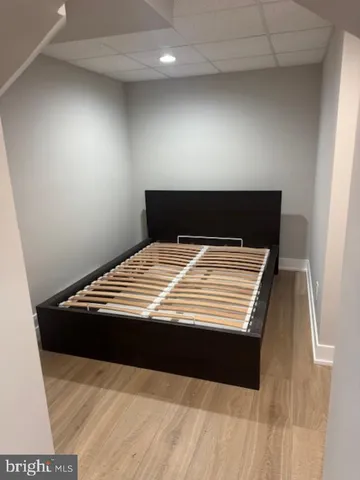 a view of room with wooden floor