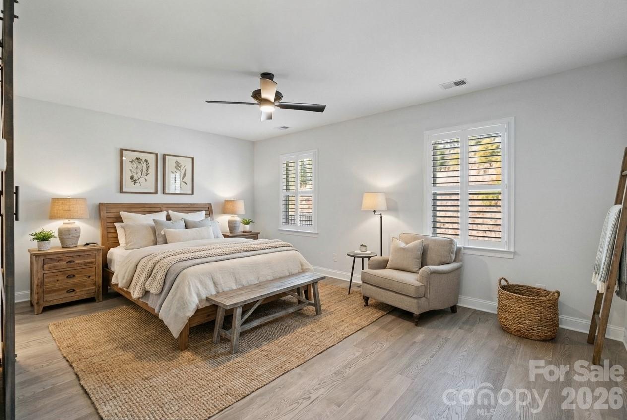 4995 Looking Glass Trail Denver, NC 28037 - Photo 26 of 46 a bedroom with a bed and a couch