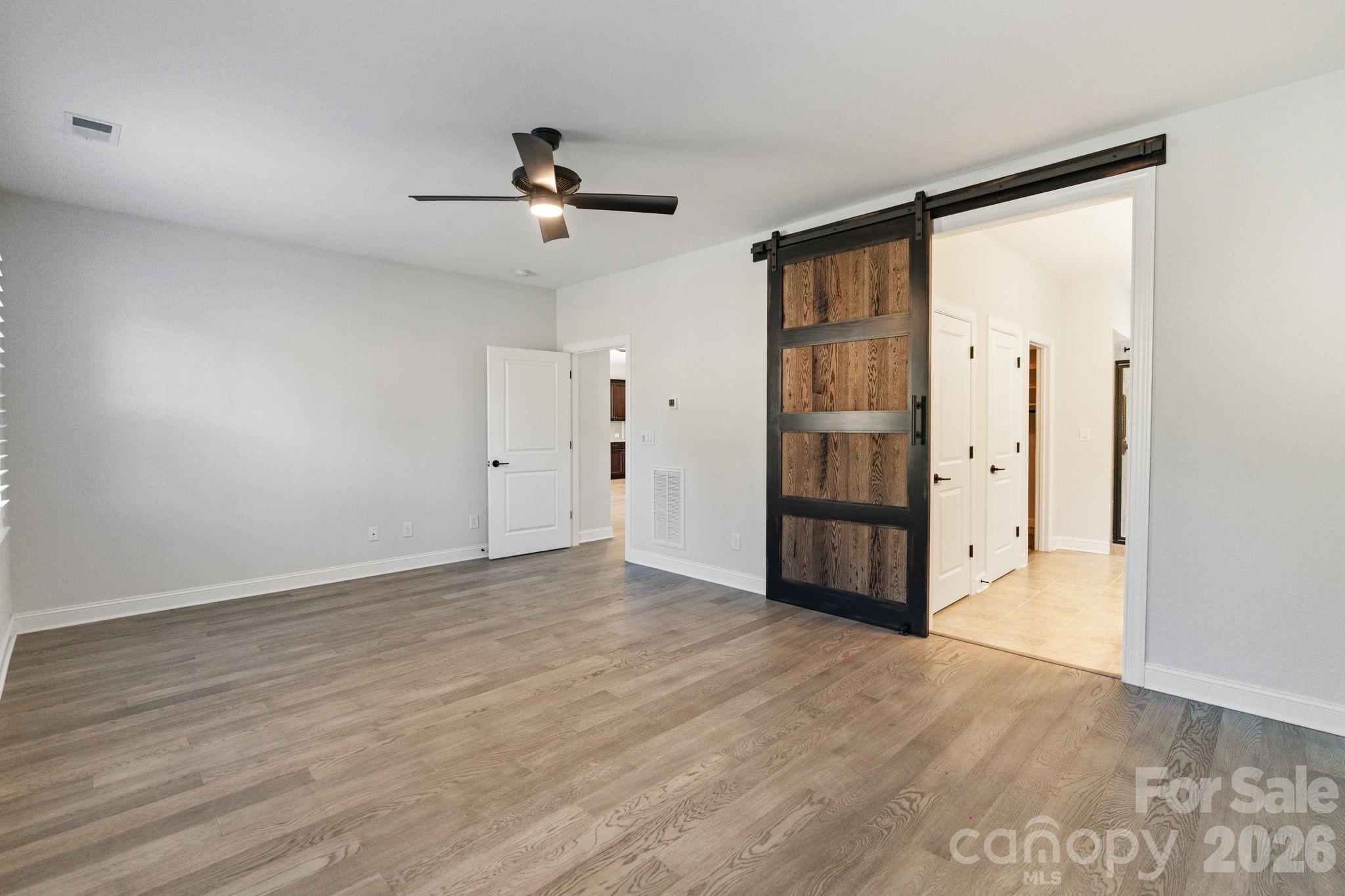 4995 Looking Glass Trail Denver, NC 28037 - Photo 27 of 46 wooden floor in an empty room