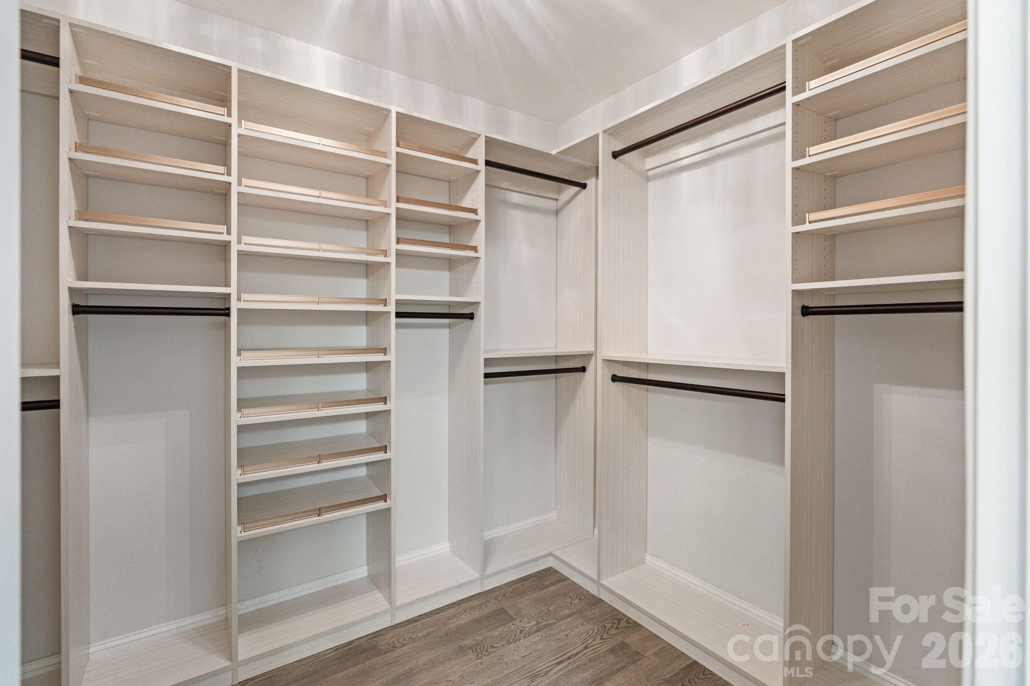 4995 Looking Glass Trail Denver, NC 28037 - Photo 30 of 46 a view of walk in closet with empty racks