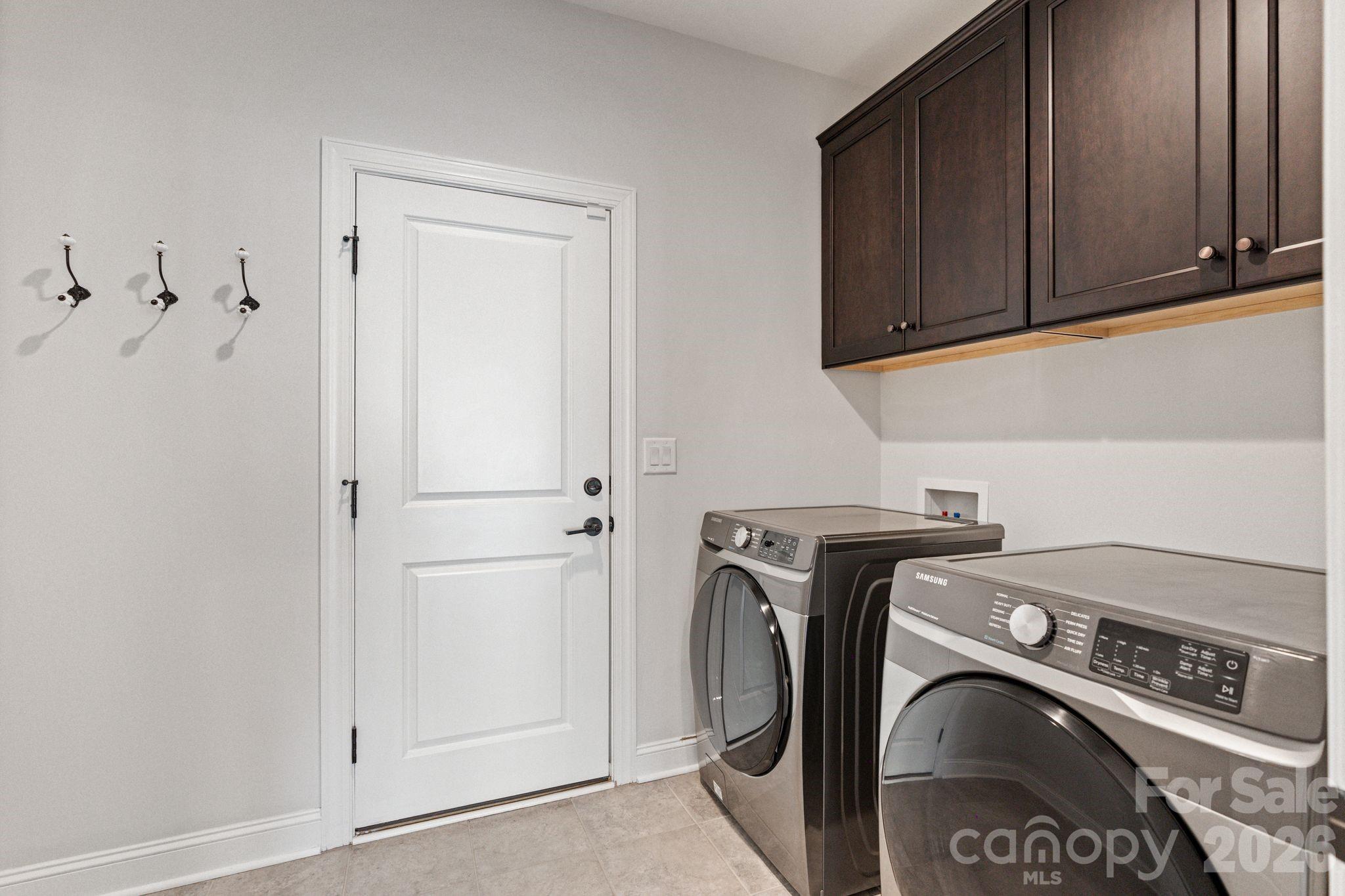 4995 Looking Glass Trail Denver, NC 28037 - Photo 32 of 46 a utility room with dryer and washer