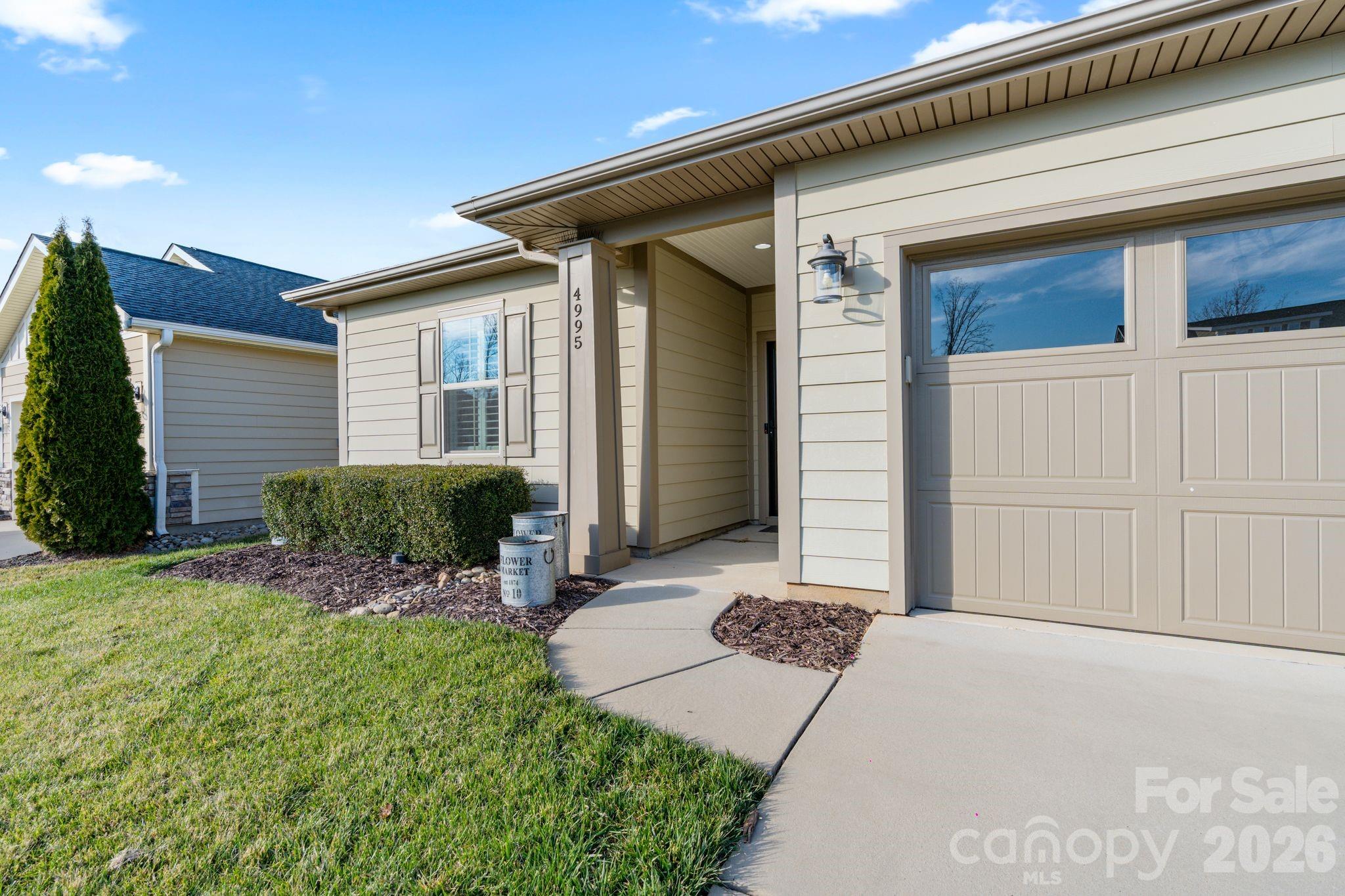 4995 Looking Glass Trail Denver, NC 28037 - Photo 4 of 46 a view of a house with backyard and sitting area