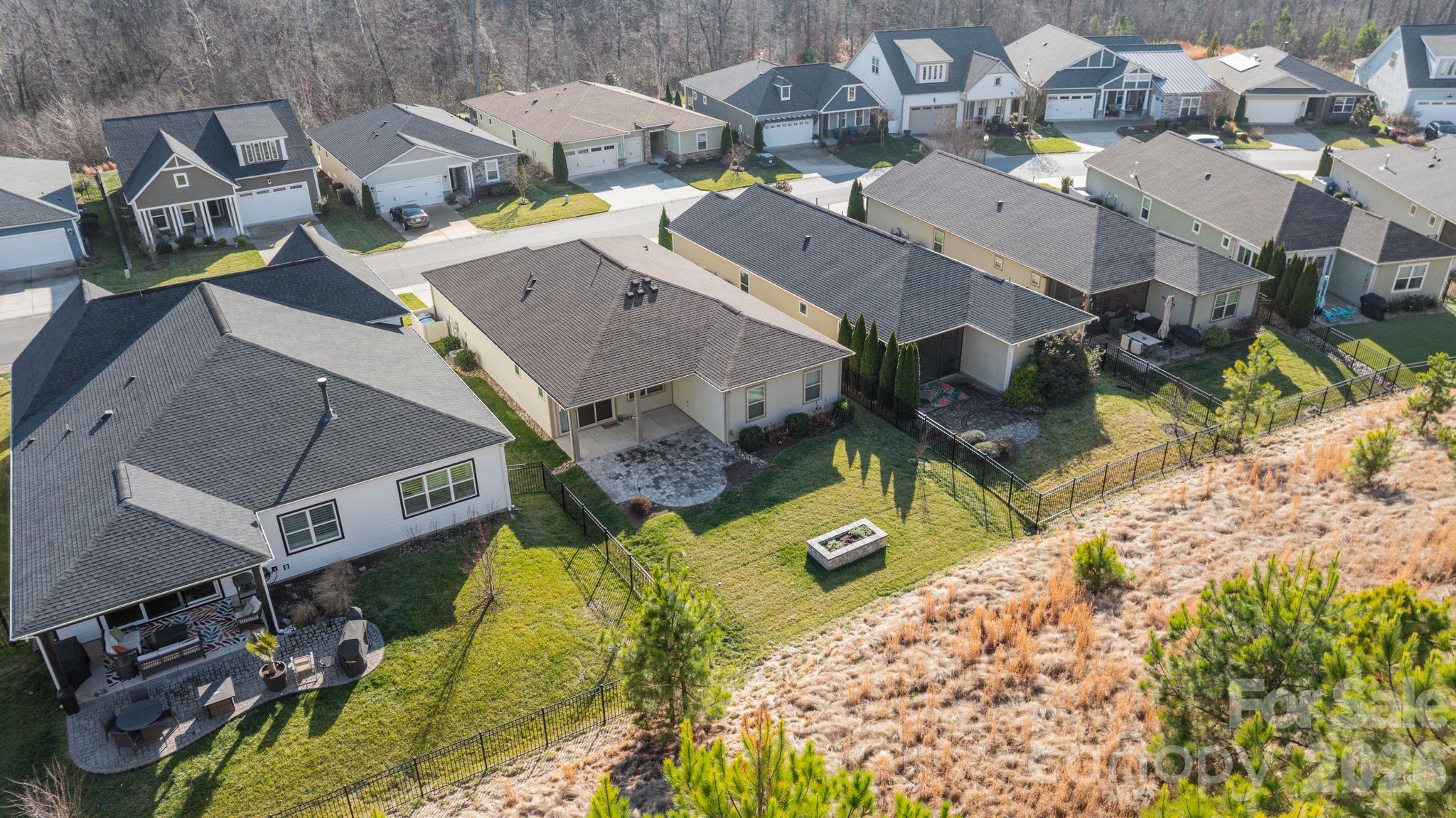 4995 Looking Glass Trail Denver, NC 28037 - Photo 41 of 46 an aerial view of a house with a swimming pool