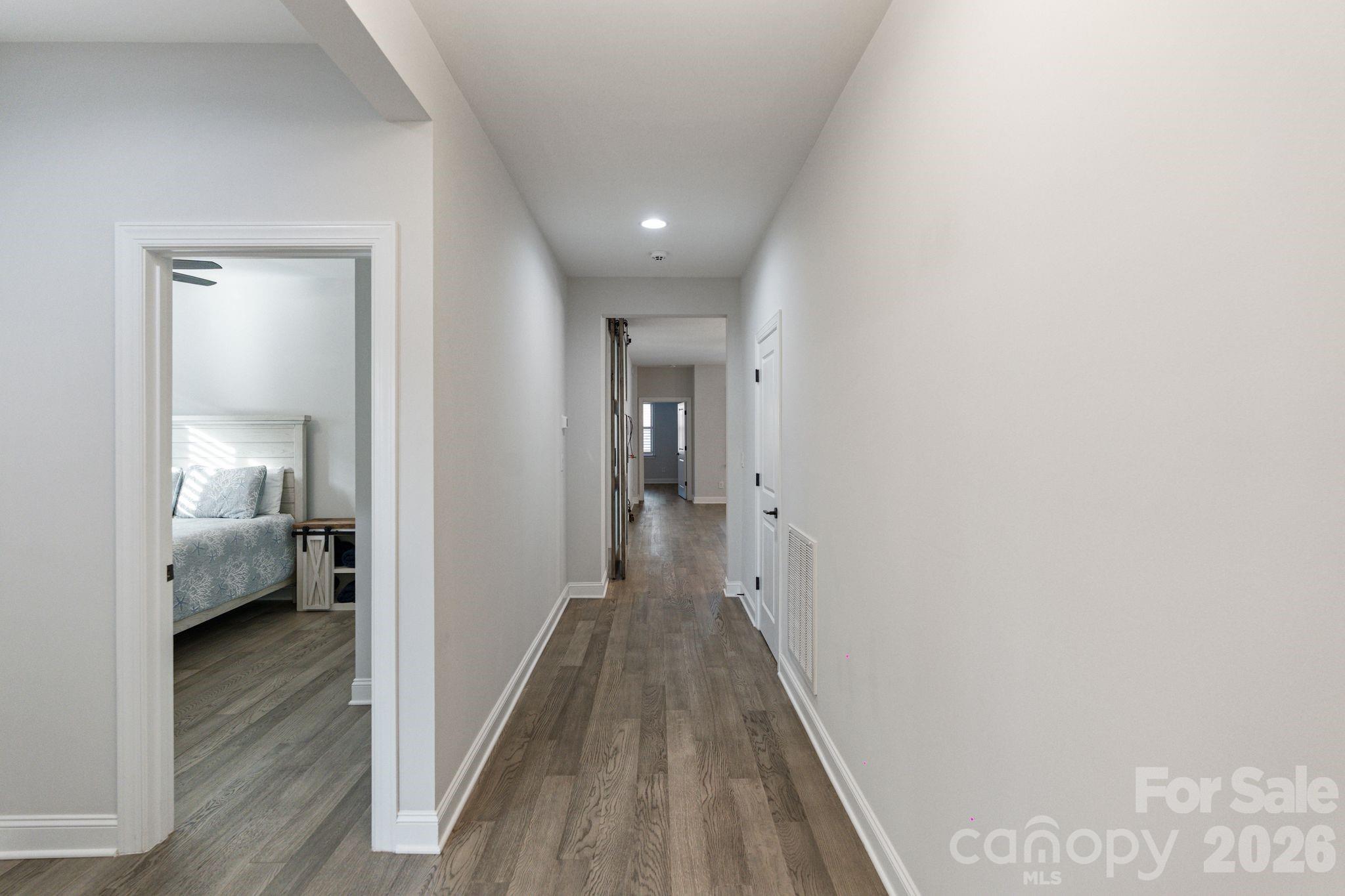 4995 Looking Glass Trail Denver, NC 28037 - Photo 6 of 46 a view of a hallway with a livingroom and a bedroom