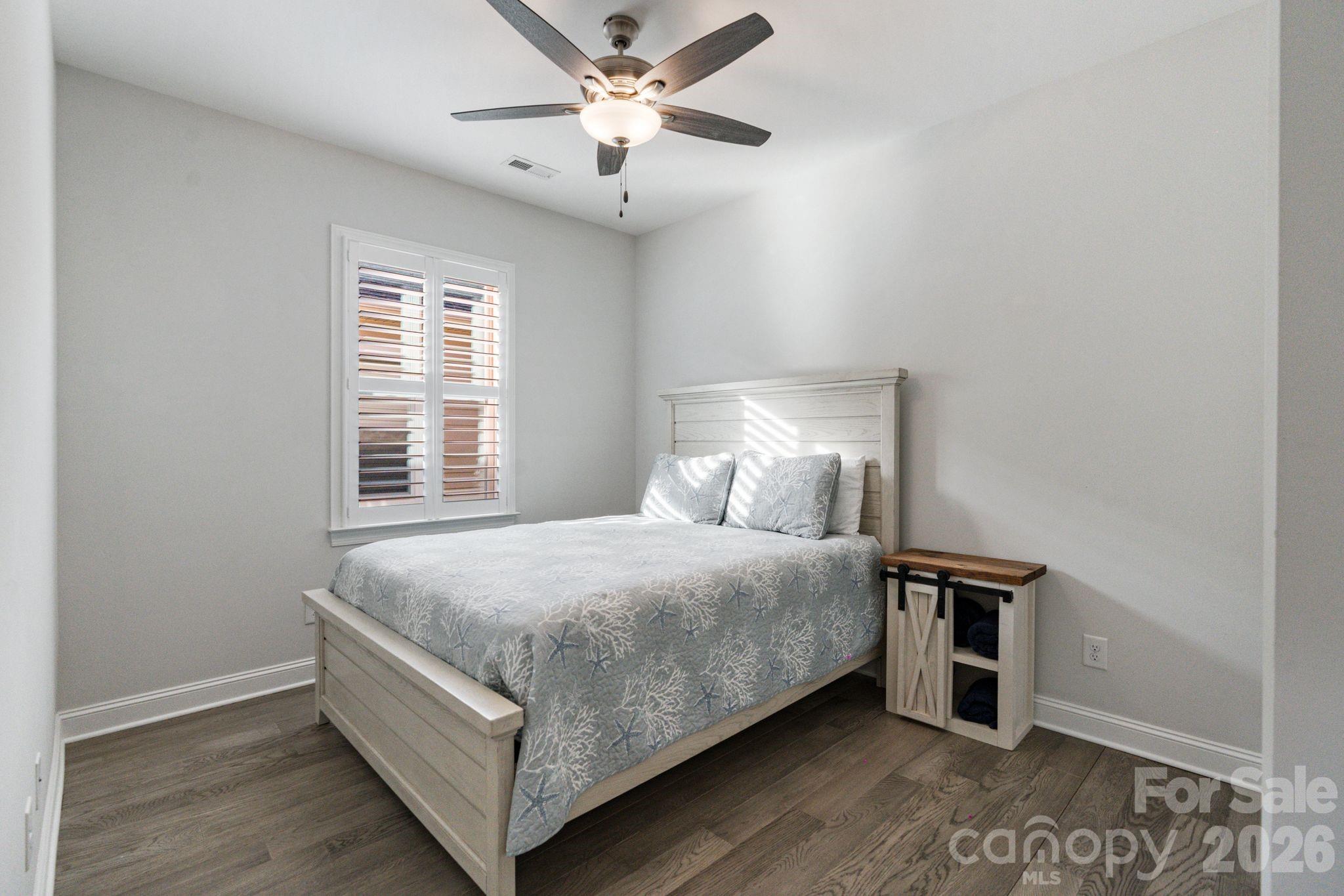 4995 Looking Glass Trail Denver, NC 28037 - Photo 8 of 46 a bedroom with a bed and a window