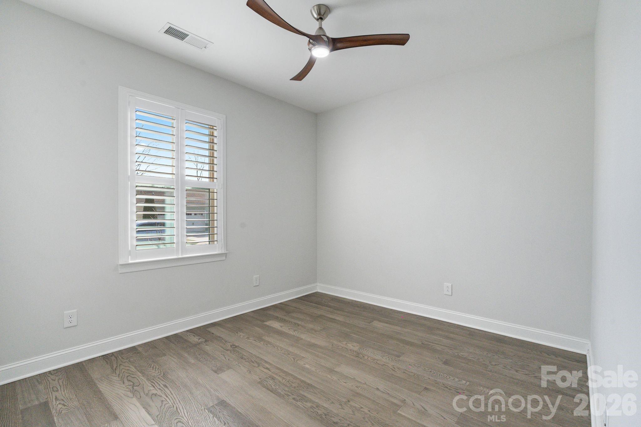 4995 Looking Glass Trail Denver, NC 28037 - Photo 10 of 46 wooden floor in an empty room with a window