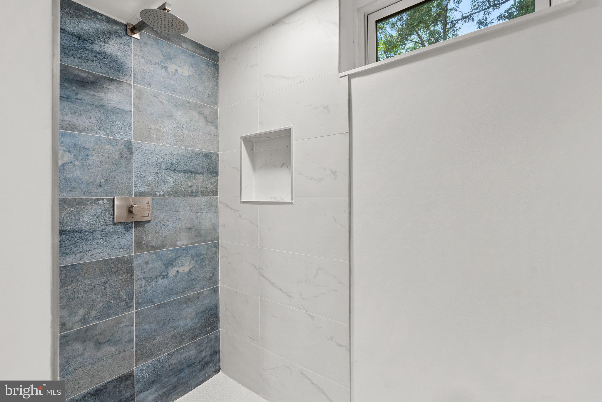 911 Kerwin Road Silver Spring, MD 20901 - Photo 37 of 54 Walk in shower w custom tile