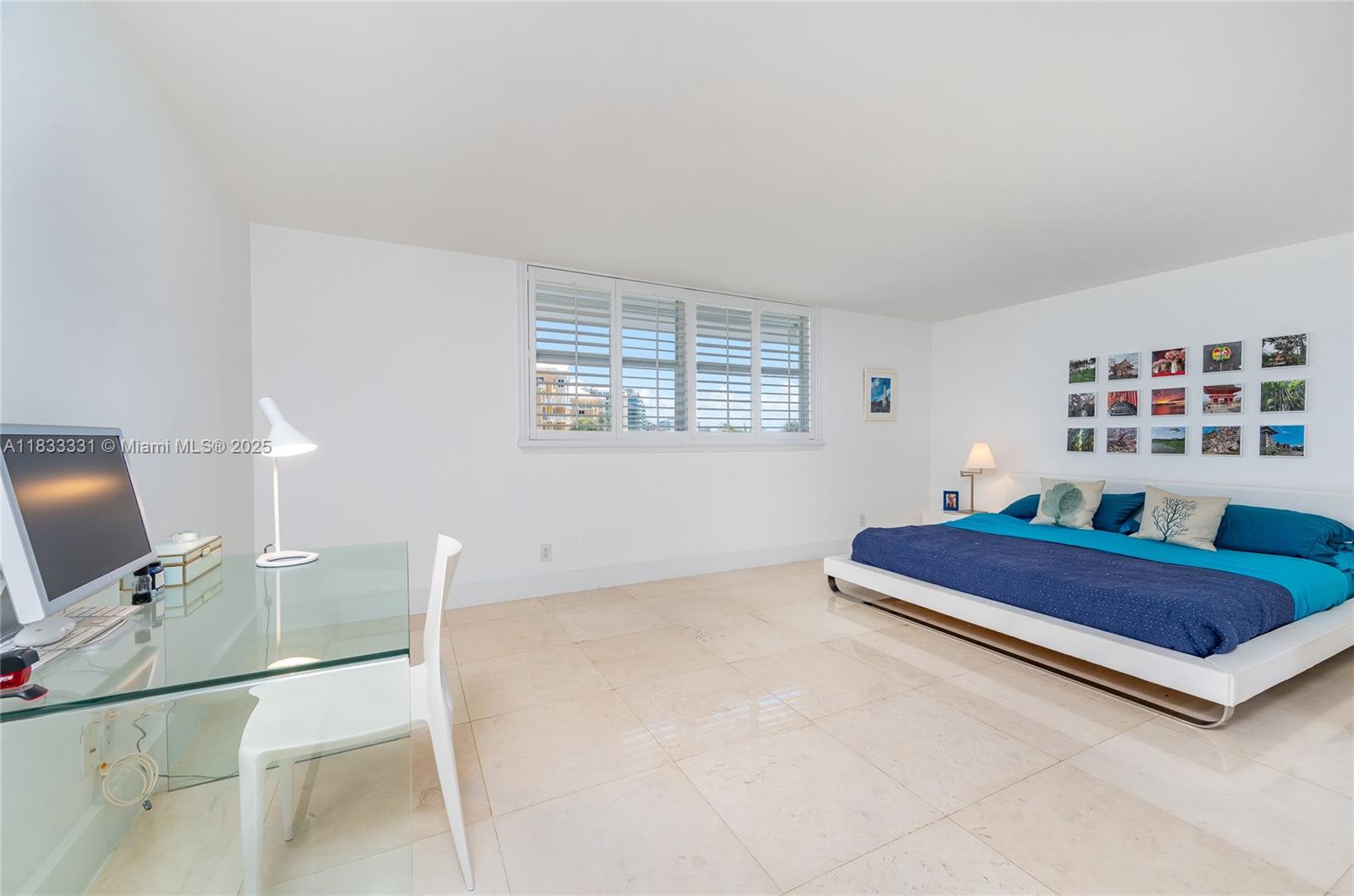 613 Ocean Drive, Unit 7C Key Biscayne, FL 33149 - Photo 20 of 42 a living room with furniture