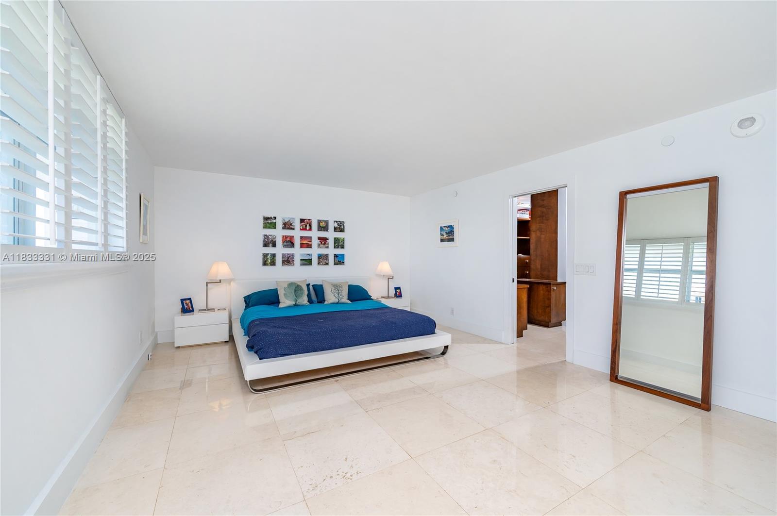 613 Ocean Drive, Unit 7C Key Biscayne, FL 33149 - Photo 21 of 42 a living room with furniture and window