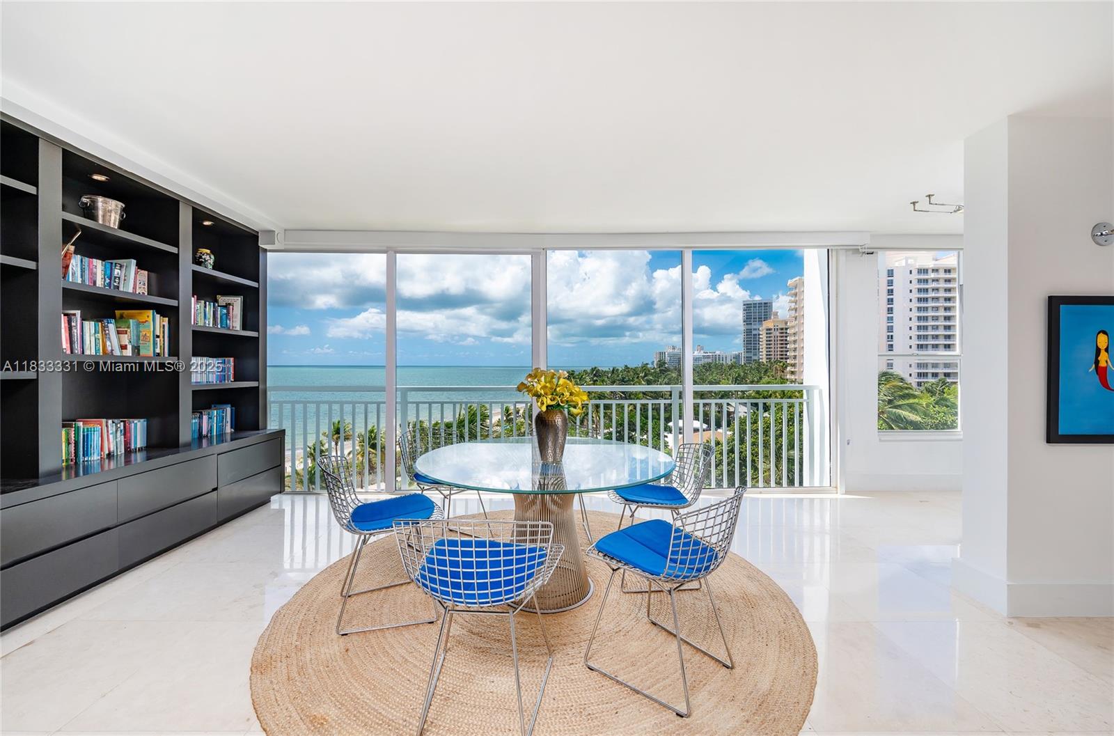 613 Ocean Drive, Unit 7C Key Biscayne, FL 33149 - Photo 3 of 42 a living room with furniture and a floor to ceiling window
