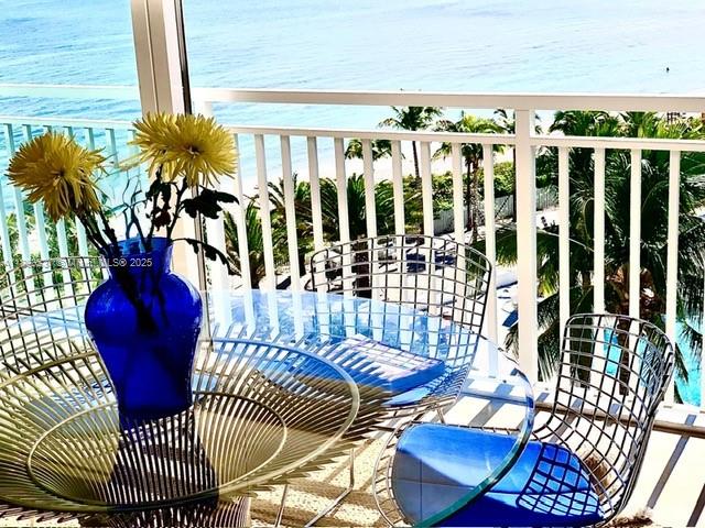 613 Ocean Drive, Unit 7C Key Biscayne, FL 33149 - Photo 4 of 42 a view of entryway and hall with wooden floor
