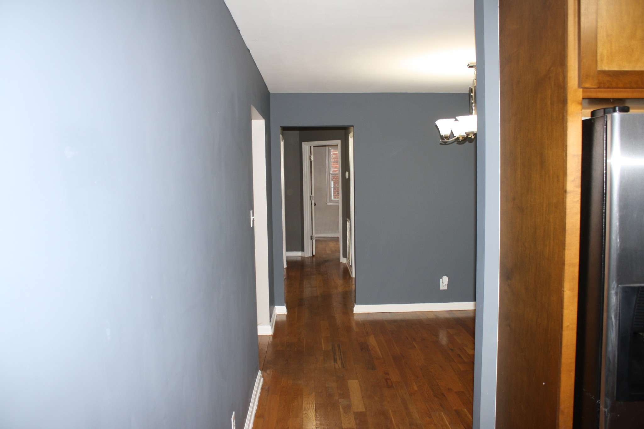 36 Benzing Road Antioch, TN 37013 - Photo 5 of 39 a view of an empty room with wooden floor and a window