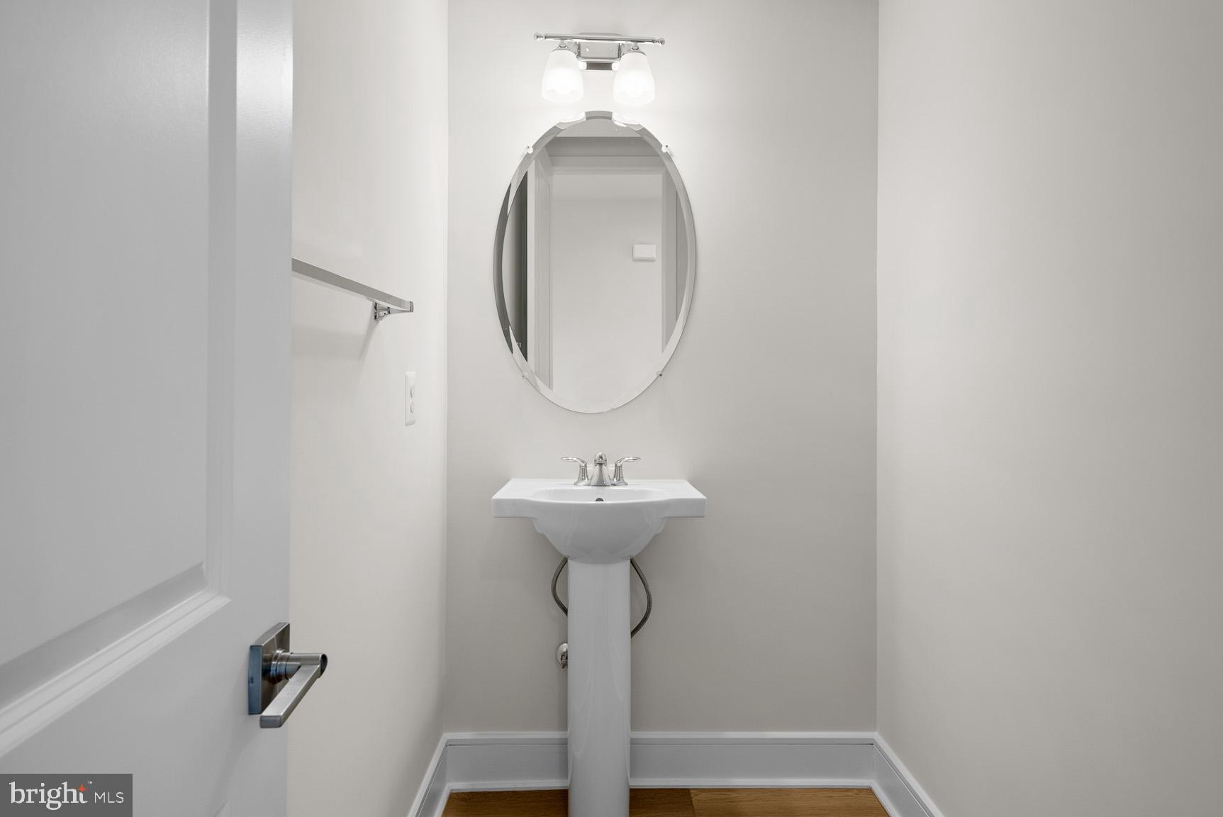 43423 Farringdon Square Ashburn, VA 20148 - Photo 16 of 31 a bathroom with a sink and a mirror