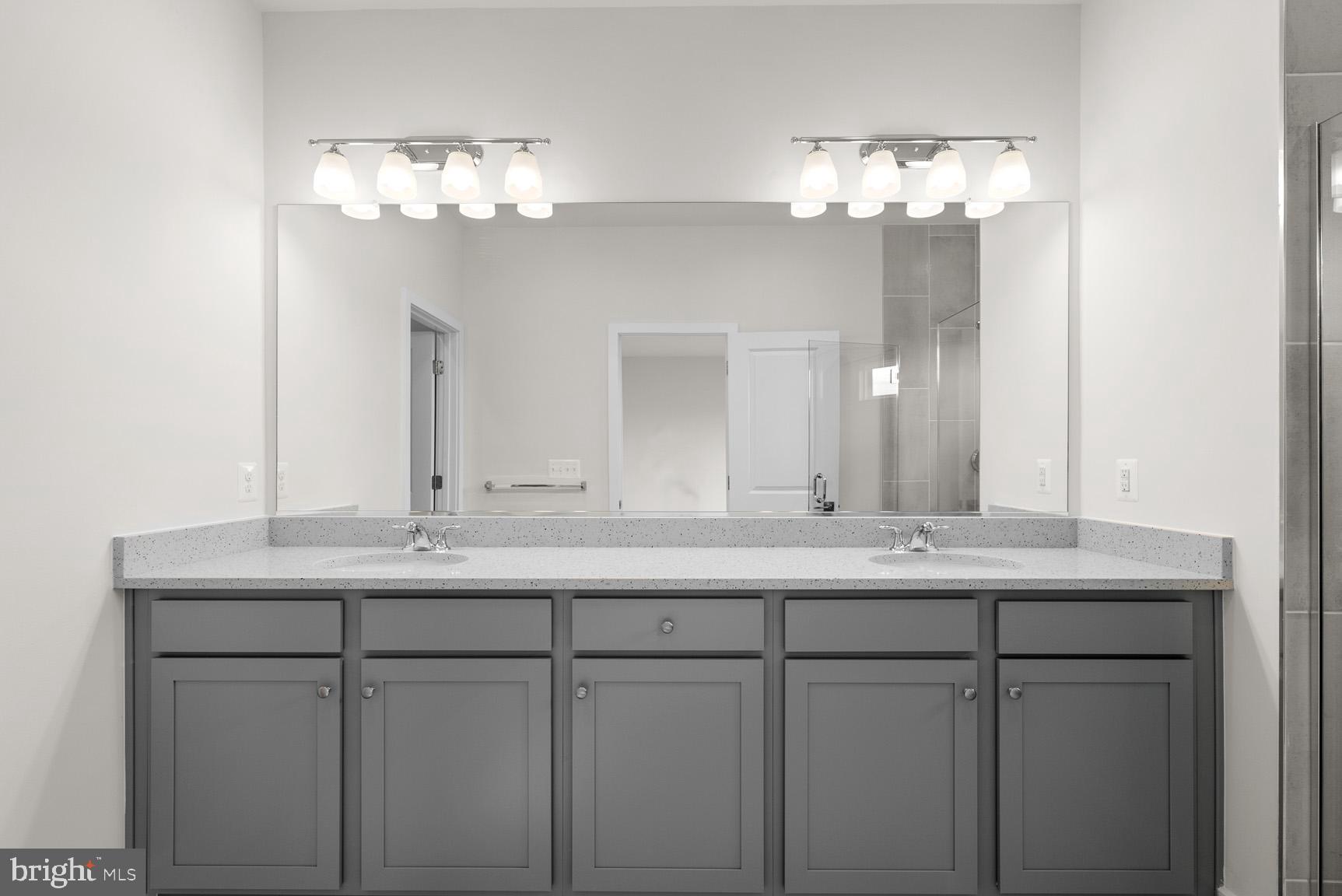 43423 Farringdon Square Ashburn, VA 20148 - Photo 20 of 31 a bathroom with a sink and a mirror